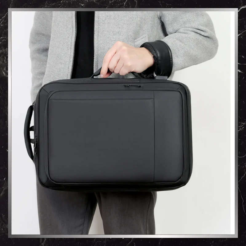 Plecak-czarny-miejski-elegancki-meski-USB-BADBAGS-wodoodporny.webp
