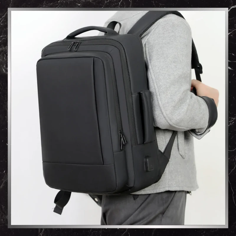 Plecak-czarny-miejski-elegancki-meski-USB-BADBAGS-wodoodporny.webp